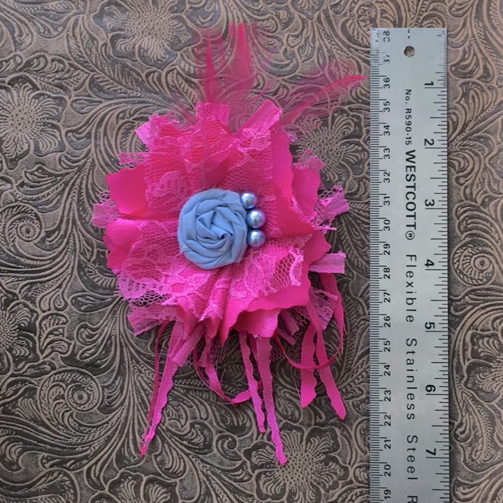 Pink flower with pin back scrappy feathers and blue fabric rosette and beads